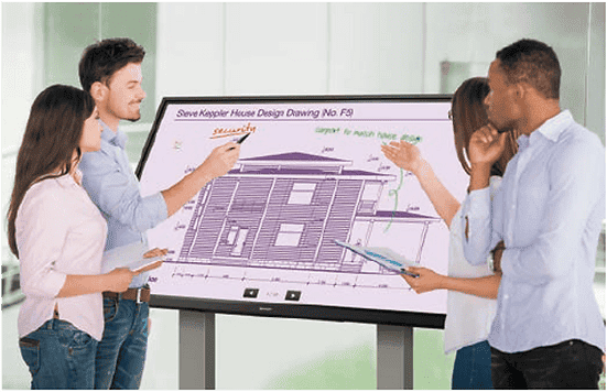 People using sharp interactive board for blue prints